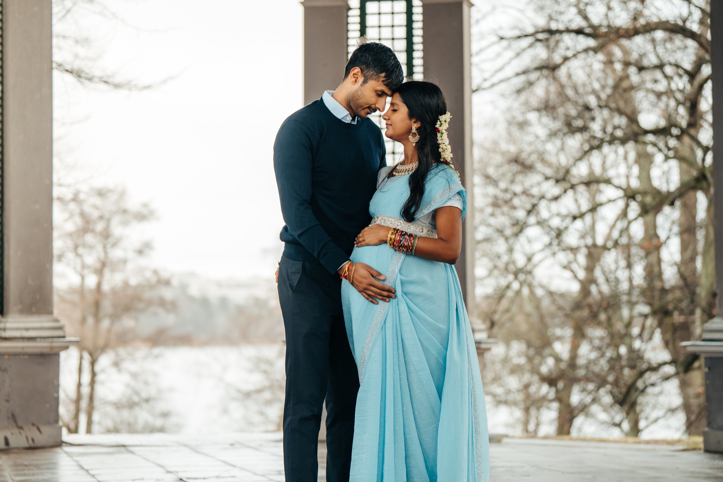 South Asian engagement portrait at pavilion